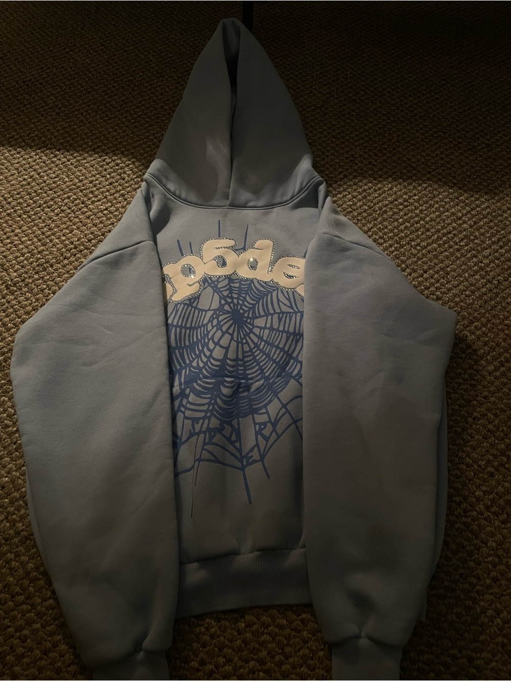 Sp5der Light Blue Hoodie. It has 2 small oil stains on it but its legit